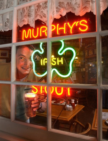 A reveler prepares for St. Patrick's Day at Murphy's Irish Pub in Sonoma. (PD file photo)